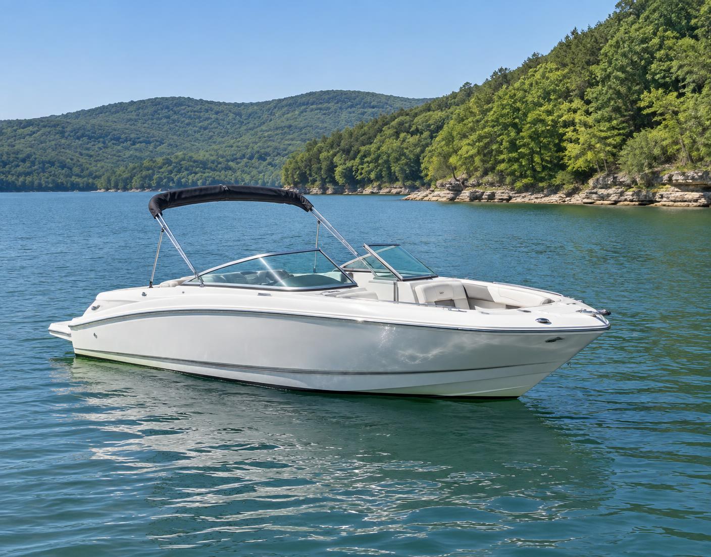 Illustrative white recreational boat on a wooded lake